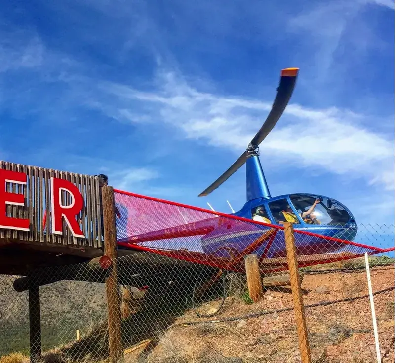 Helicopter soaring above the Royal Gorge Bridge for a thrilling aerial tour