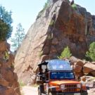 Colorado Jeep tour guide navigating the narrow roads between rock formations