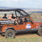 guests in jeep tour overlooking mountain at Fremont Park