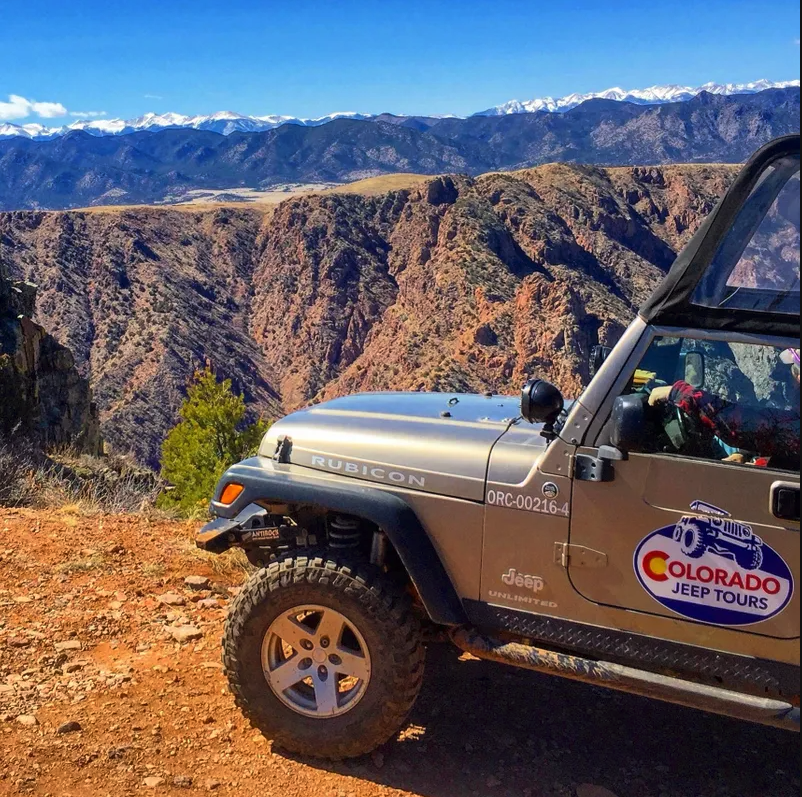 Colorado Jeep Tours stop to pose for a photo across the mountain range Royal Gorge Canon City Colorado