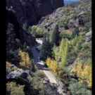 distant image of road between mountain pass Colorado Jeep Tours